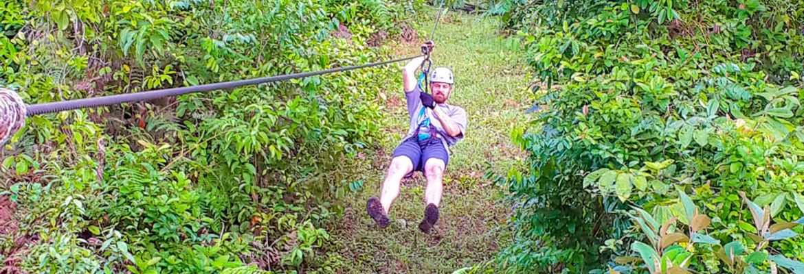 man zip linning on corcovado canopy tour