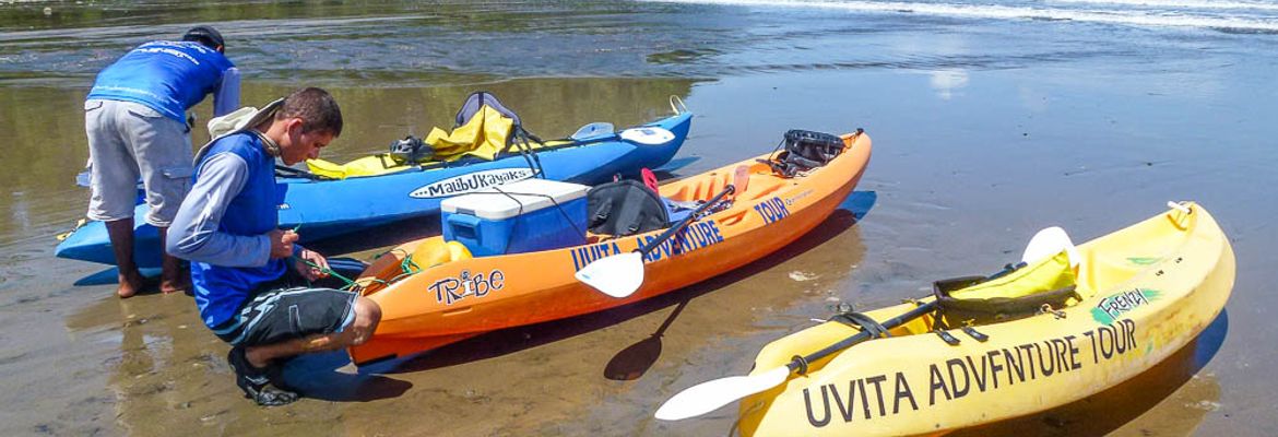 waves and caves tour three kayaks 1