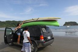 unloading SUP kayak chora island