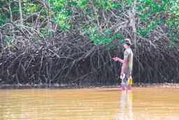 man fishing on tamarindo estuary