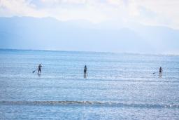 three people suping on pan dulce beach