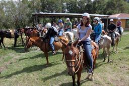 A group of students from Illinois and Georgia mount up before the ride on April 17, 2013. Education First, a study abroad program, brings students to Costa Rica to learn more about the culture, language and environment.