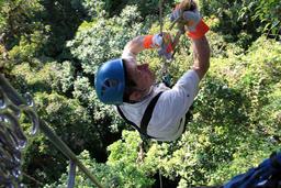 A man prepares for the 100 foot rappell from the top of a tree on April 17, 2013.