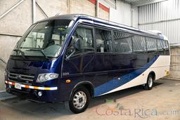21 passenger volare coach lateral view