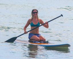 girl suping at playa pan dulce