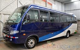 21 passenger volare coach parked lateral view