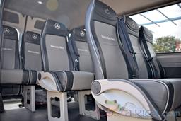 white mercedes benz sprinter van heredia seat rows with arm rest closeup