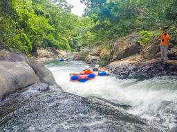sliding on rock surfaces rio negro tubing rincon de la vieja
