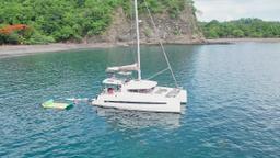 people on board aerial view 41 foot luxury charter catamaran guanacaste