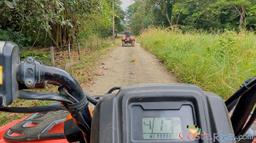 atv nosara tour guide going in front on a dirt trail