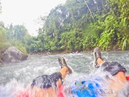 soaking in blue river waters on an inner tube rincon de la vieja