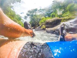 on the rapids from the tub raft view tubing rincon de la vieja