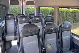 white mercedes benz sprinter van heredia seat row view from driver seat