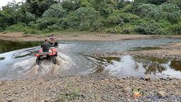 atv nosara tour crossing river confluence