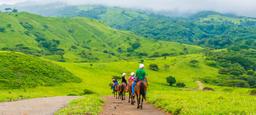 group descending to tizati river valley horseback ride tour western side of rincon de la vieja volcano