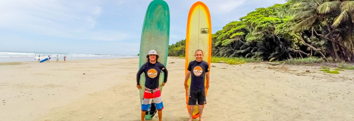 olingo tours surf lesson students holding board